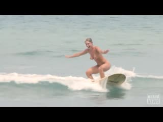 carefree cmnf video - naked blonde takes surf lessons from clothed instructor